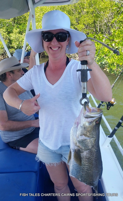 Erin showing us her half of! Barramundi while estuary fishing in Trinity Inlet, Cairns!