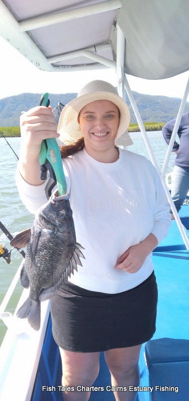 Jemma and his Pikey Bream while Estuary fishing in Trinity Inlet, Cairns
