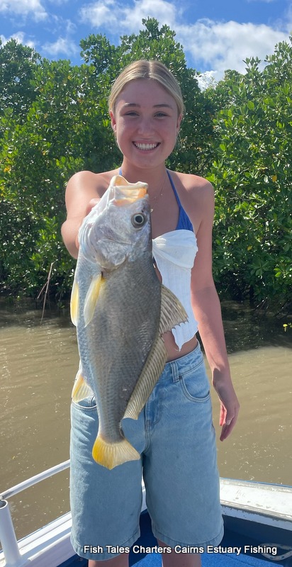 Bonnie showing us her catch of a Sliver Jewfish while estuary fishing in Trinity Inlet, Cairns!