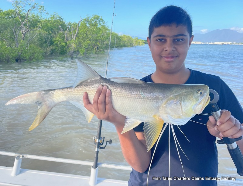 Clair is delighted with her first ever fish-Goldspotted Estuary Cod while estuary fishing in Trinity Inlet, Cairns!