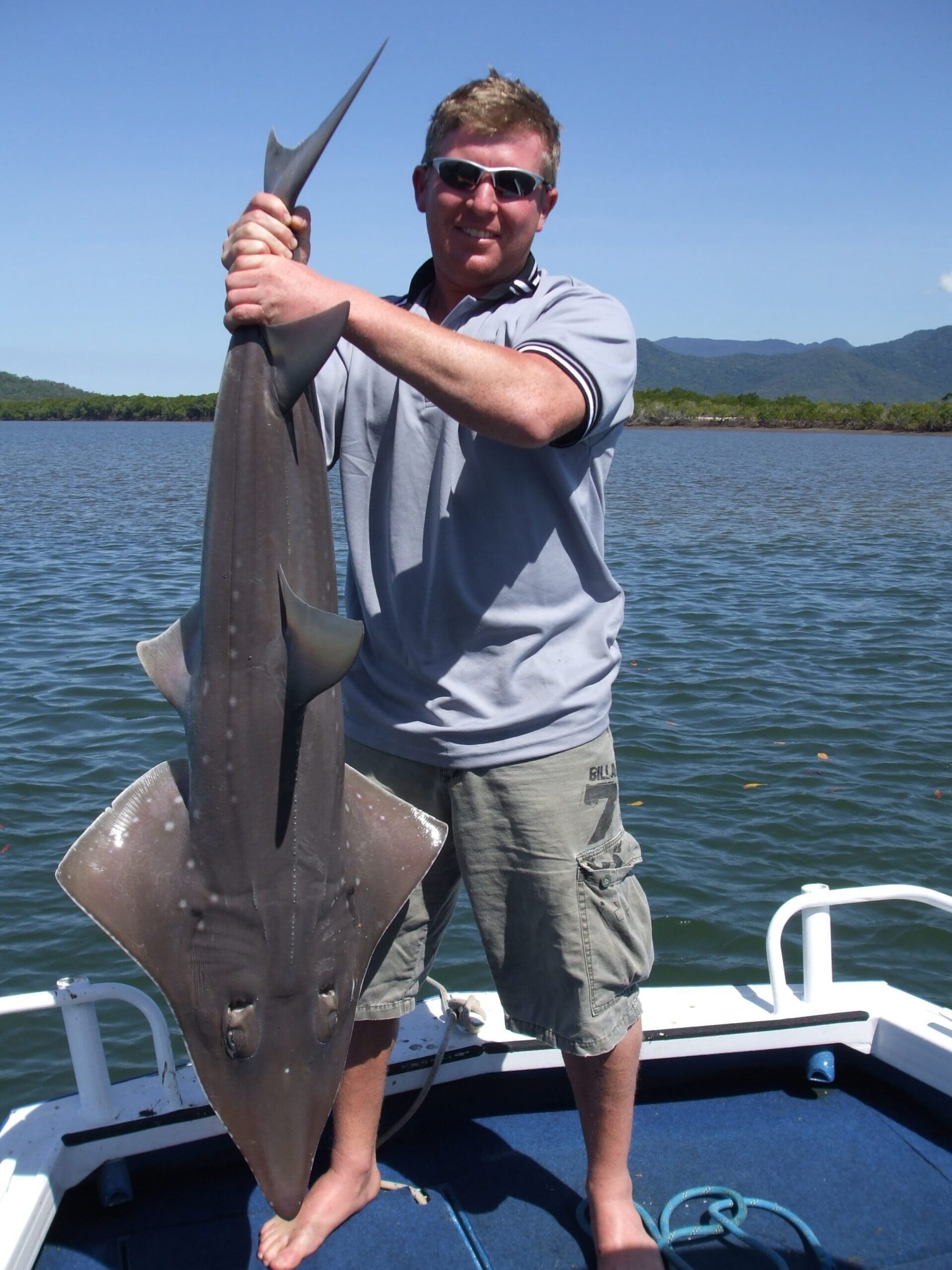 Bonnie showing us her catch of a Sliver Jewfish while estuary fishing in Trinity Inlet, Cairns!